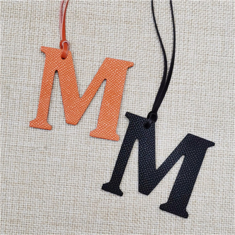 XMESSUN New English Letters M  - Monogram Keychain Leather ulasan dan harga